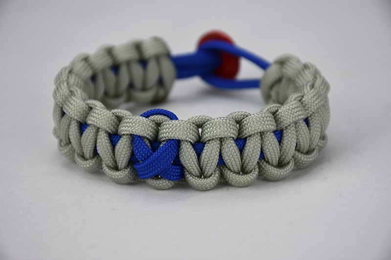 blue and grey anti-bullying paracord bracelet with blue and red button, blue and grey anti-bullying paracord bracelet with a blue ribbon and red button fastener unity band