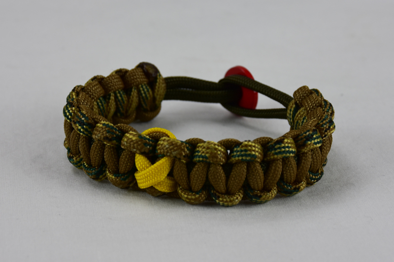 od green multicam camouflage and coyote brown military support paracord bracelet with red button in the back and yellow ribbon