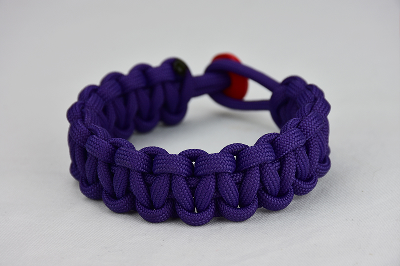 purple paracord bracelet unity band, picture of a purple paracord bracelet with a red button fastener