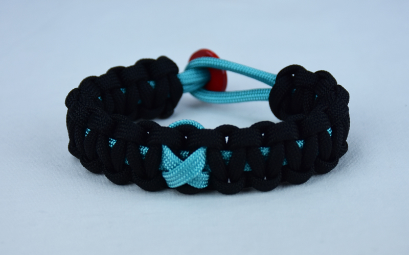 teal and black ptsd support paracord bracelet with red button back and teal ribbon